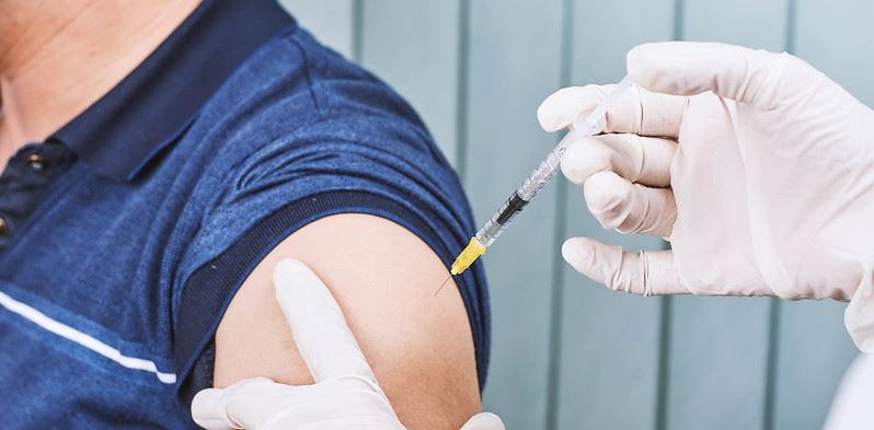 Man receiving an injection
